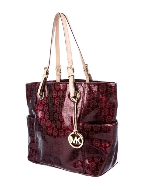 Michael Kors patent leather handbags